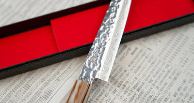 Compact Japans keukenmes Kotetsu Petty VG-10 Damascus 150mm Braainest