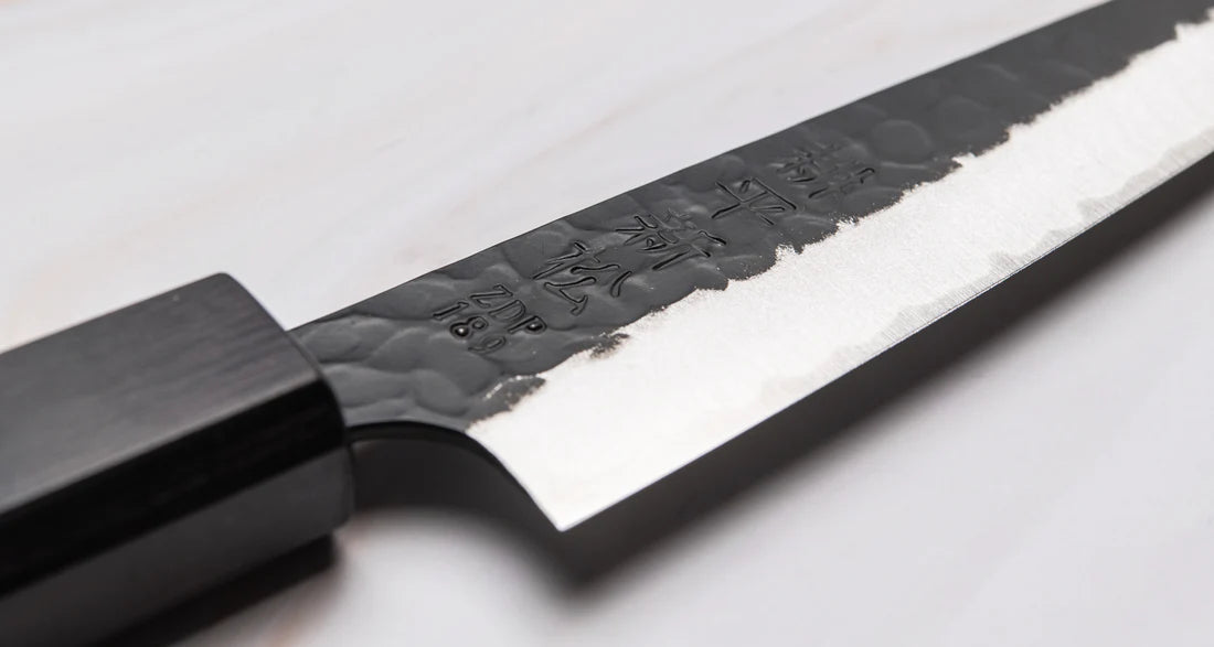 Uitmuntend Japans mes Kouhei-Shinmatsu Petty Black 135mm Braainest